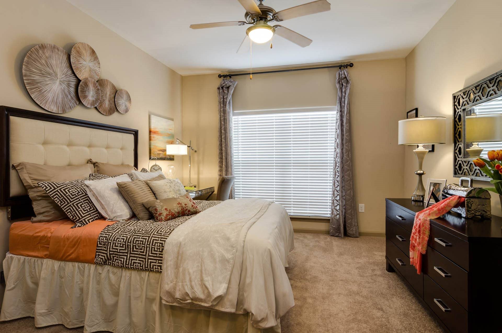 Spacious Guest Bedroom Guest Bedroom that easily fits queen size bed featuring large windows at Ashley Auburn Point in Atlanta, GA